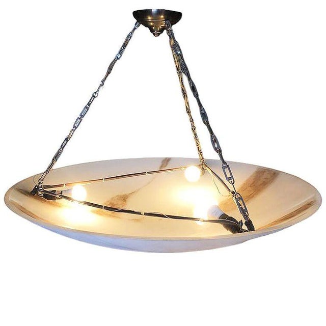 Bespoke One of one Art deco style Faux Alabaster Novara Saucer chandelier features a large, bowl-shaped shade crafted with...