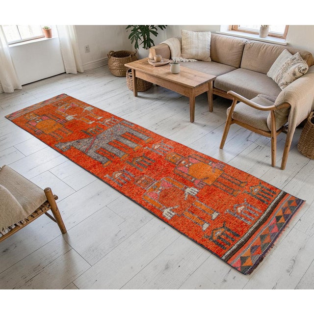 Hand-knotted in Southeastern Anatolia during the 1960s, this exceptionally rare runner rug brings a captivating...