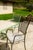 Shedir is a metal outdoor chair crafted in Italy in the tradition of wrought iron, reinterpreted with a contemporary...