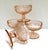 Sweet set of four textured pink champagne colored coupes. Floral patterned with grooved and scalloped rims and floral stem...