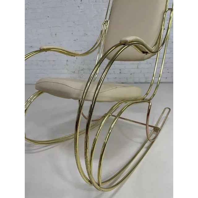 Rocking Chair in Brass and Imitation Leather, 1950s, in Very Good conditions. Designed 1950 to 1959
