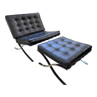 Late 20th Century Vintage Black Barcelona Style Chair and Ottoman - A Pair For Sale