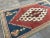This is a vintage Turkish Oushak rug from the 1960s. The piece was hand-knotted.