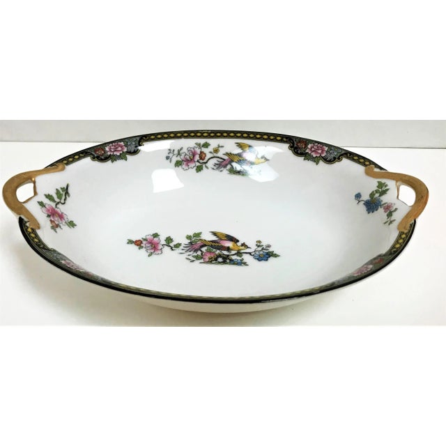 Beautiful Japanese Noritake porcelain serving bowl in the "Pheasant" pattern. Gold painted handles and trim details. Circa...