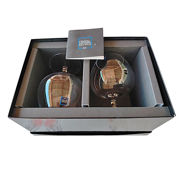Pair of Sèvres crystal tasting glasses in their original case, model R810, with their original identification label on the...