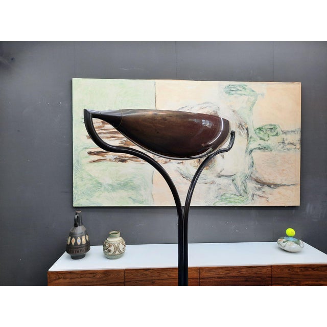A beautiful and rare floor lamp by Florian Schulz. This elegant floor lamp has a solid slate base to which the brass lamp...