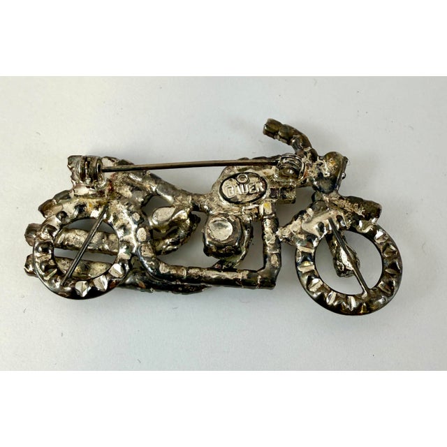 Vintage 1990s Dorothy Bauer motorcycle chopper. Signed and prong set. 2.25” x 1”