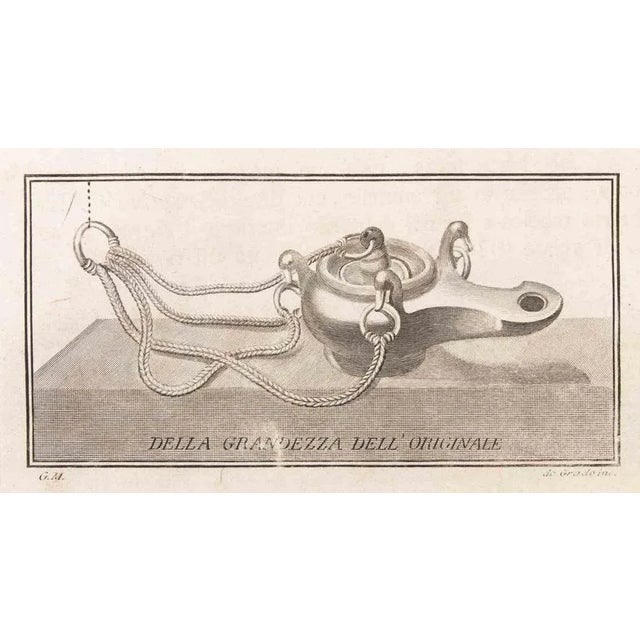 Oil lamp to hang is an etching realized by filippo de grado (1705-1780). The etching belongs to the print suite...