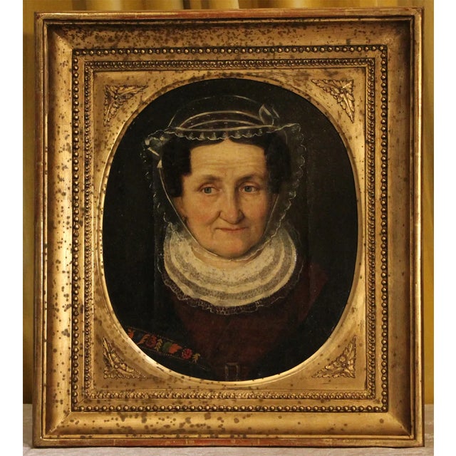 This remarkable oil painting, dating back to the first half of the 19th century Biedermeier era, portrays a waist-high...