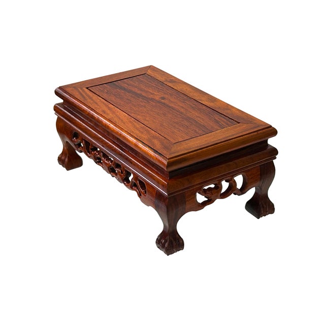 This intricately crafted wooden display stand riser easel exudes traditional elegance, making it a perfect platform for...