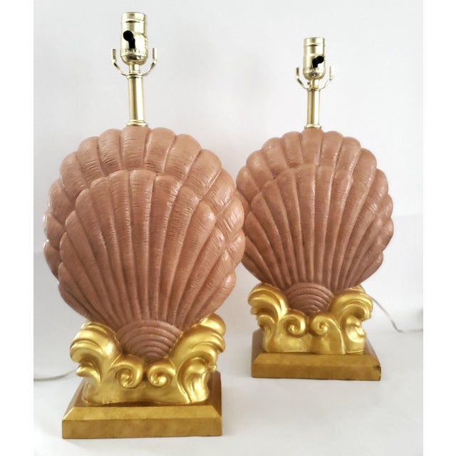 Offering a restored vintage pair of seashell table lamps, Late 20th Century. These gorgeous lamps were completely...