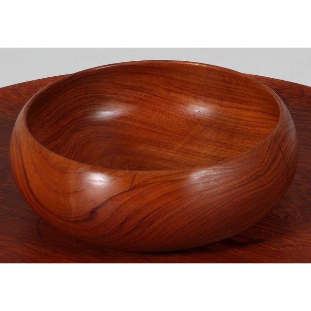 Turned wood bowl in Teak for Kay Bojeson. Appears to be completely original condition and patina. This piece is attributed...