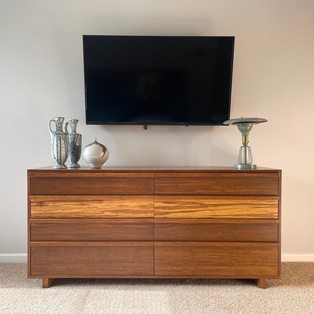 Pre-owned Greenington Magnolia dressers. Each of 8 drawers feature contemporary styling, clean lines and beautiful tiger...