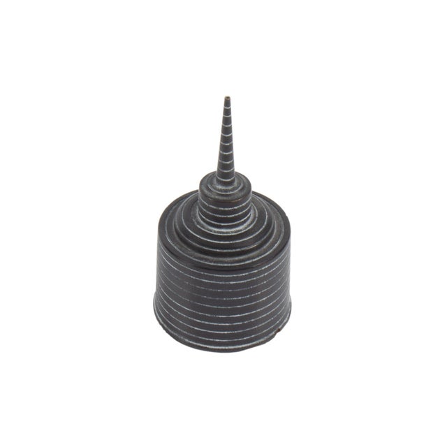 A turned wood oil can sculpture by the American artist Chris Bowman. This black wooden sculpture is carved with gray...