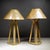 ABOUT A pair of solid bronze brutalist tripod candlesticks holders with bronze plated perforated shades and removable...