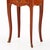 Finely crafted with richly figured wood inlaid surmounted by shaped marble tops, each cabinet is enhanced with finely cast...