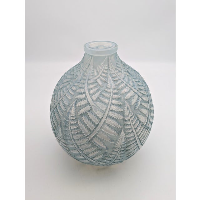 An exceptional and highly collectible cased opalescent glass "Espalion" vase, designed by the master of Art Deco...