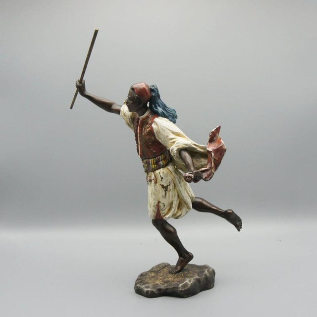 Running man' a cold painted and patinated bronze sculpture by franz bergman. Signed with bergman b to bronze. Dimensions:...