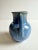 Mid Century pottery vase with a blue and green drip glaze style finish.