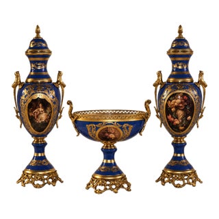 French Style Blue Porcelain Garniture Set With Two Covered Vases and Central Jardinière, Bronze and Gold Leaf Details For Sale