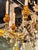 The 19th century Italian giltwood and crystal chandelier is a stunning and elegant lighting fixture perfect for any dining...