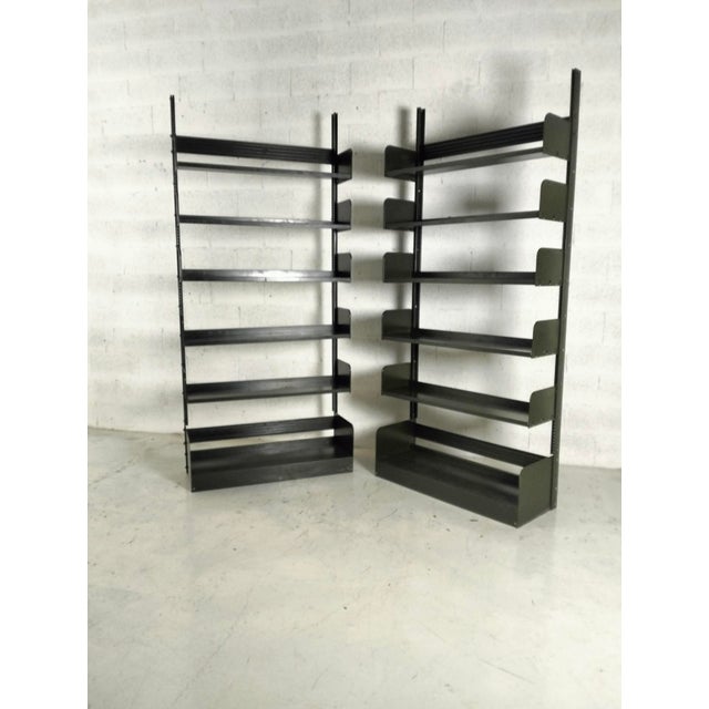 Congresso' shelving unit by Lips Vago. In olive green lacquered steel, Italy, 1960s. with adjustable shelves. A classic...