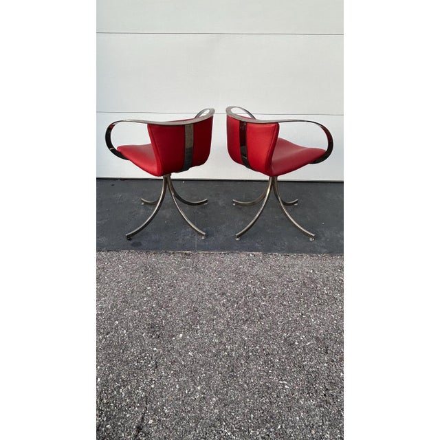 This is such a beautiful pair of chairs. The lines of the chair speak for themself. The style is like a scoop. The metal...