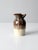 This vintage handmade studio pottery creamer has a distinctively shaped, pinched spout, creating a sculptural and...