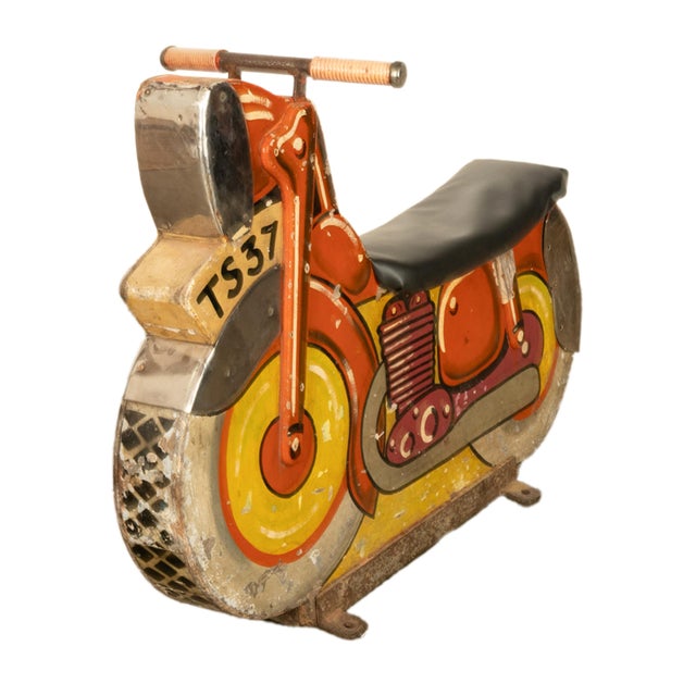 Antique American carnival amusement park, carousel motorcycle ride, from the late 1940s. A fabulous late 1940s motorcycle...