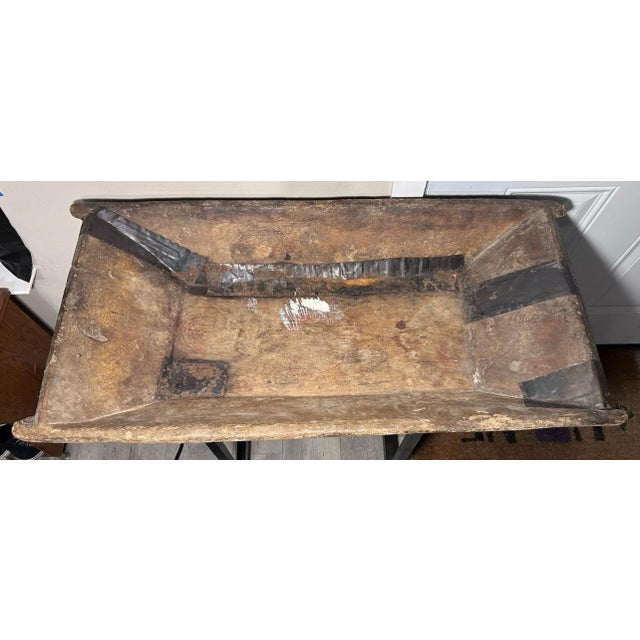 Up for sale is a Circa 1870 American Primitive Wooden Dough Bowl! It measures 5 1/4” tall, 38 1/4” wide, and 18 1/2” deep....