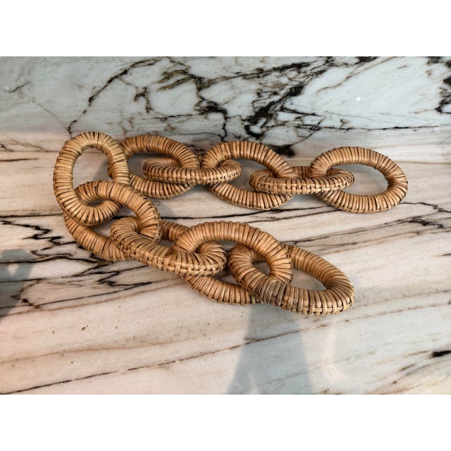 Beautiful and great decorative piece, set of two, 5 link chain mango wood body, wrapped in natural rattan decorative...