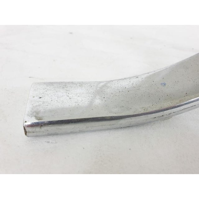 Chrome base and smoked glass top. The glass has a chip, the frame has some rust spots.