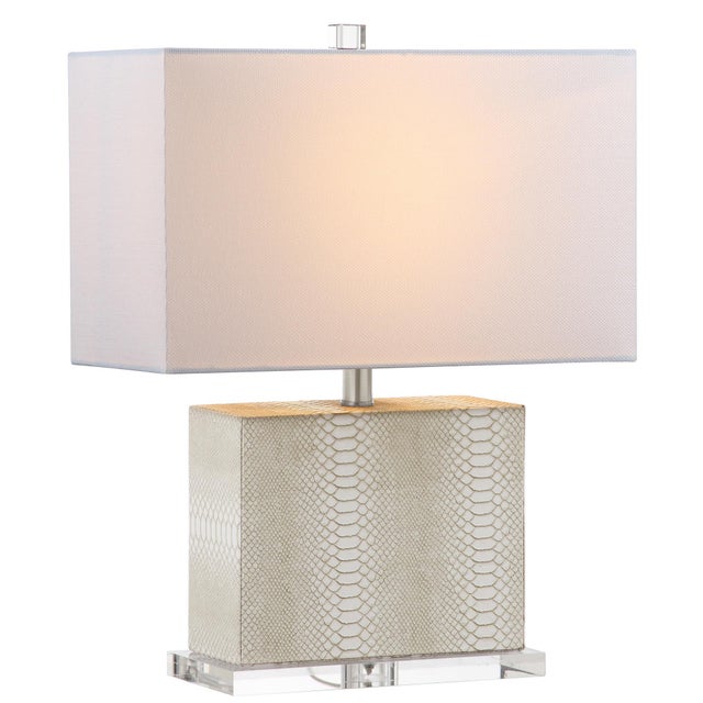 Designs from vintage films sets in the 20th century’s modern metropolis’ inspired this modern table lamp. a interior...