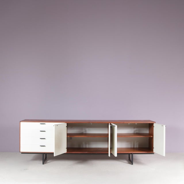 1960s sideboard from the C-serie by Cees Braakman, produced by Pastoe in the Netherlands, is a refined example of post-war...