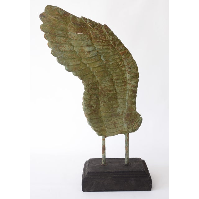 Incredible large wing sculpture on stand! Made of plaster with supporting metal stems and quite heavy. This piece can be...