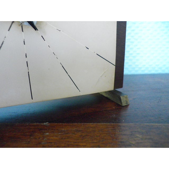 Electric mantel clock, 1950s/60s, Nufa (Germany), 2 hands and sweep second hand, steel dial resting on a wooden (teak)...