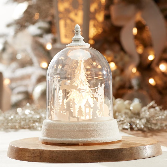 Celebrate the magic of Christmas Eve with this LED Rotating Santas Sleigh Globe. Featuring wintry white tones and a...