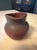 This Vintage Van Briggle Pottery Mulberry Persian 2.5" Pitcher is a handmade clay pitcher in a distinctive round shape,...