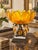 Striking vintage Hollywood Regency centerpiece featuring a substantial amber glass bowl with a dramatic sculptural petal-...