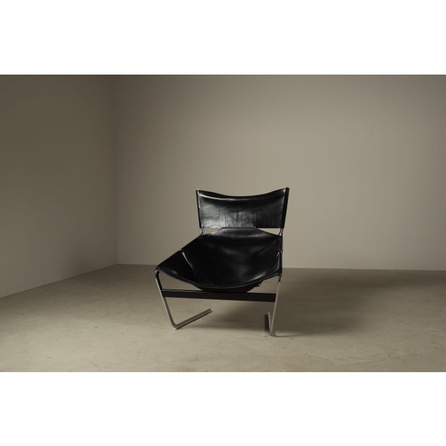 A sculptural and highly recognizable lounge chair designed by pierre paulin for artifort in the netherlands during the...