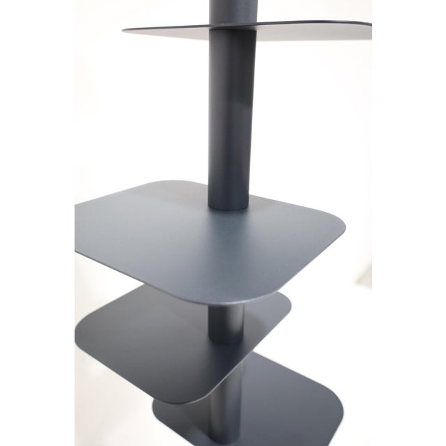 With a small footprint, and discreet frame, Story Bookcase was designed to make the most of your space and show off books...