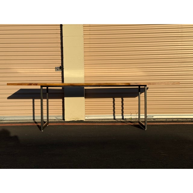 A beautiful and substantial solid wood dining or conference table by Urban Hardwoods, showcasing the brand’s signature...