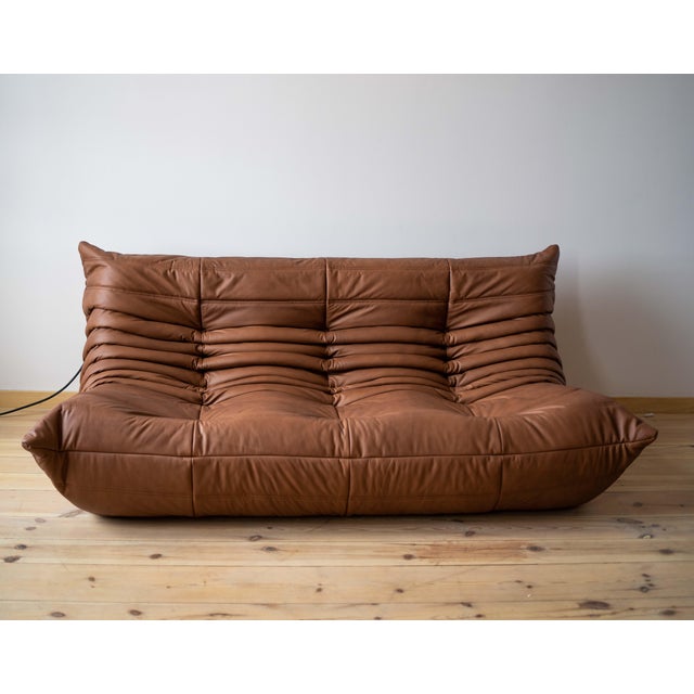 This Togo has been reupholstered with new foam and high-quality new fabric, keeping its inner structure giving the item...