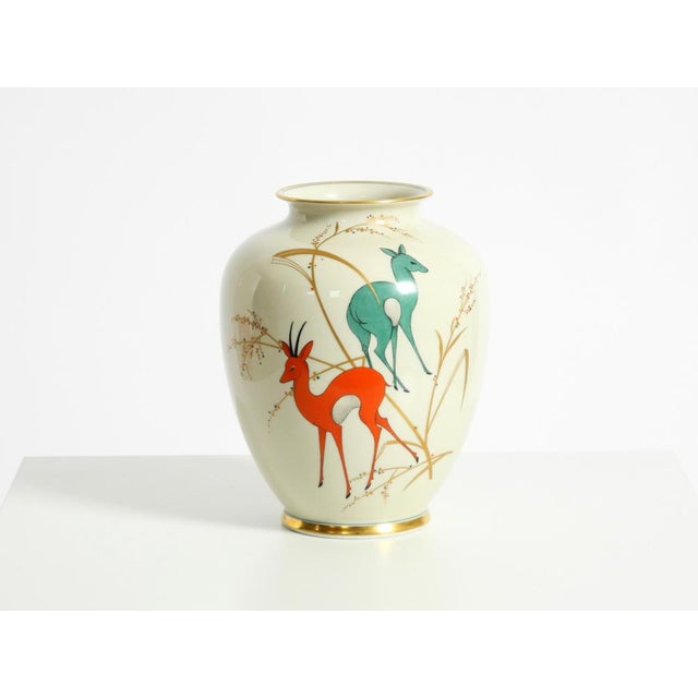Beautiful light beige porcelain vase with hand-painted deer and wildlife motifs. Made in the 1940s by the Marktredwitz...