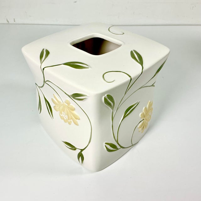 This is the lovely Penelope pattern from Croscill. It features an Art Nouveau style floral pattern with sage green stems...
