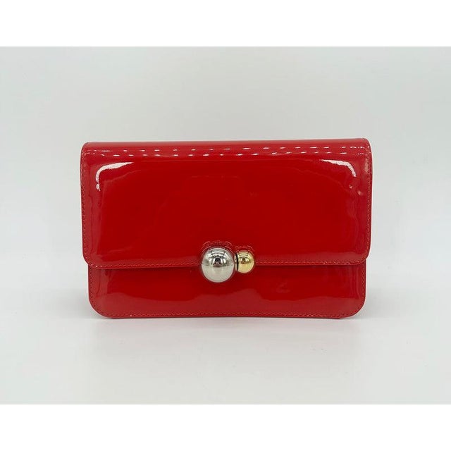 Christian Dior Red Patent Leather Tribale Chain Flap Bag in excellent condition. Vibrant red smooth patent leather...