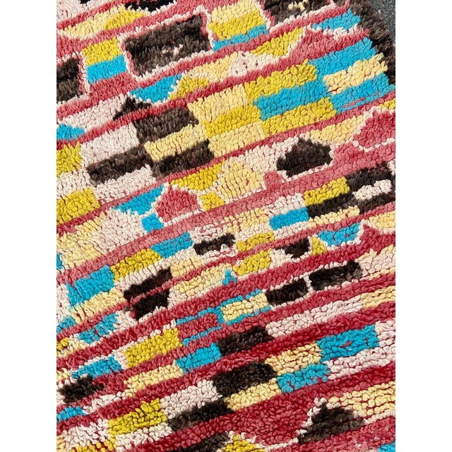 Boujad rugs are hand woven pile rugs from a small region in Haouz between the Middle Atlas and the Atlantic ocean. Made by...