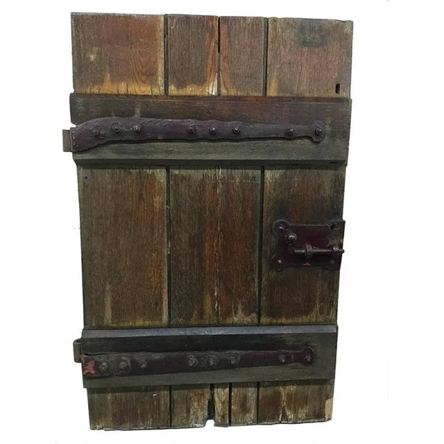 Antique oak door from the Church O.L. Vrouw van Lourdes Kerk, The Haque in The Netherlands Herkenbosch Blokstraat, closed...