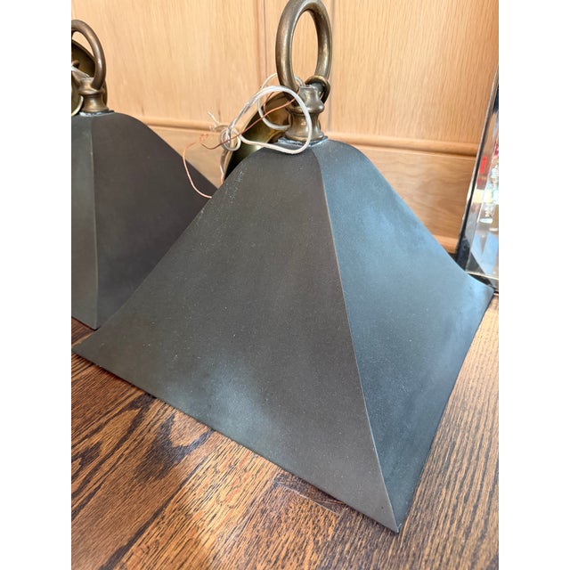 A beautiful set of three Gibson pendants by The Urban Electric Co., known for its timeless, handcrafted lighting. The...
