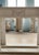 This finely carved neoclassical marble fireplace mantle embodies the grace and symmetry of 18th-century design. The frieze...